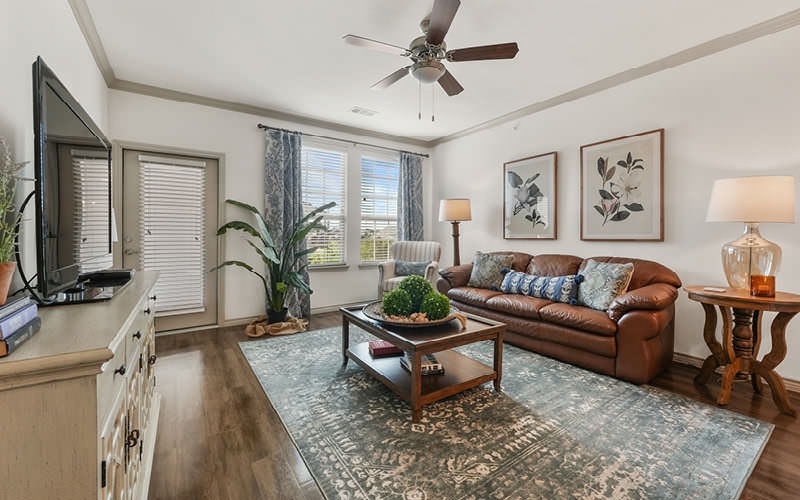 large living room with windows