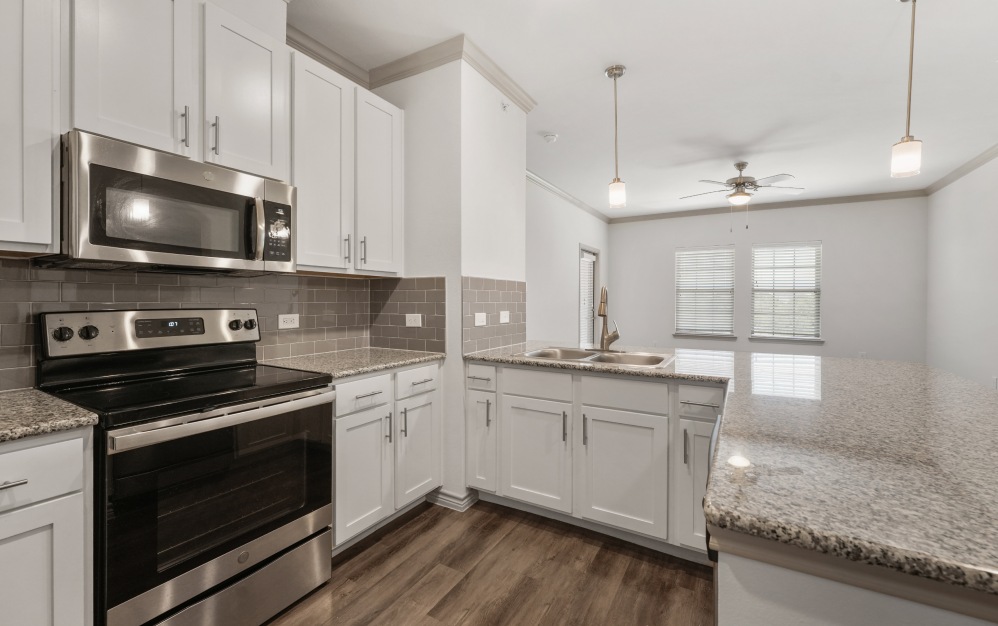 Well-lit kitchen with ample counter space