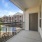 private balcony overlooking pool area