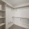 walk-in closet with built-in shelving