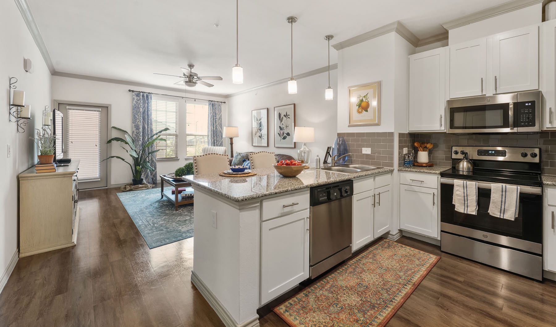 kitchen with an island and direct access to living room